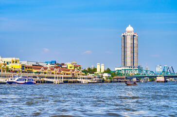 Sailing on Chao Phraya river in central district of Bangkok, Thailand