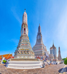 White Prangs of Wat Arun religion complex is the most visited landmark of Bangkok, Thailand