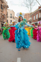 Fototapeta na wymiar Young woman in a carnival parade