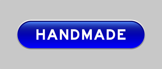 Blue color capsule shape button with word handmade on gray background