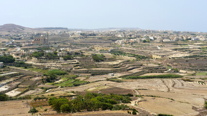Obraz premium The view across the small island of Gozo, Malta from the citadel, in Victoria