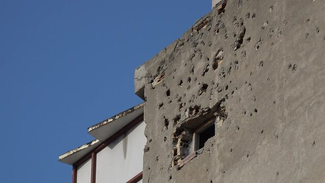Bullet holes in damaged apartment building in Northern Nicosia, the divided capital of Cyprus

