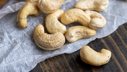 Hard roasted and peeled cashew nuts on the table