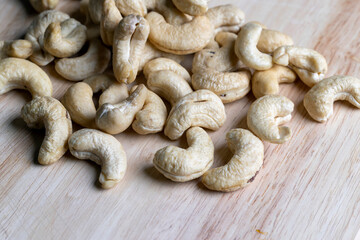 Fresh peeled cashew nuts on the table