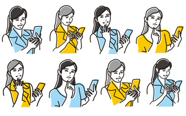 スマホを見て微笑んだり思案したりする素敵な女性