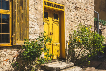 old house in the town of island country, yellow door