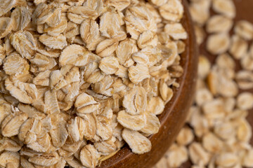 Oat flakes poured on the kitchen table