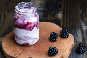 Fresh delicious milk yogurt with blackberry flavor