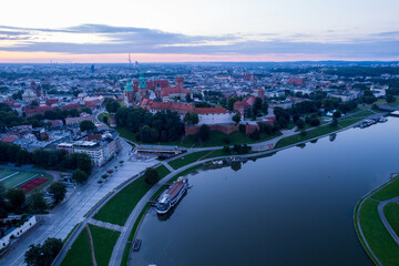 Obraz premium Krakow, Cracow, Lesser Poland Voivodeship. Krakus Mound, Market Square in Krakow, Wawel Castle and other popular buildings and architecture in Krakow.