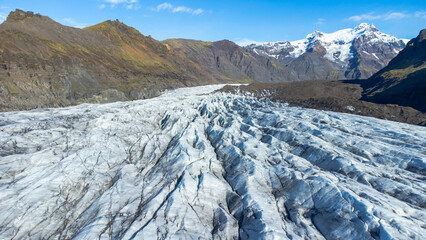 Fototapeta na wymiar Vatnajokull Glacier in Iceland, Pure Blue Ice Texture at Winter Season, Aerial Top View Landscape.