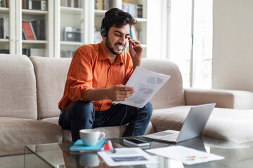 Young arab man CEO working from home, have online meeting