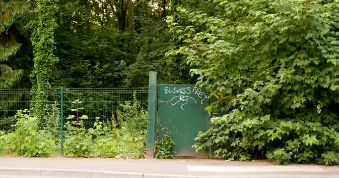 Elsass Frei signage on a street door entrnace gate with translation Free Alsace 
