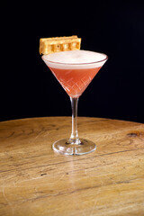orange cocktail with belgian waffle