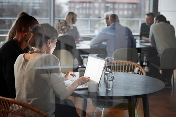 Women talking in cafeteria