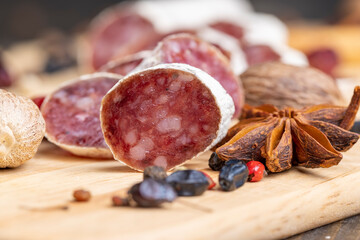 Chunks of sliced sausage with white mold