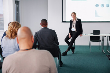 Woman having a presentation during meeting