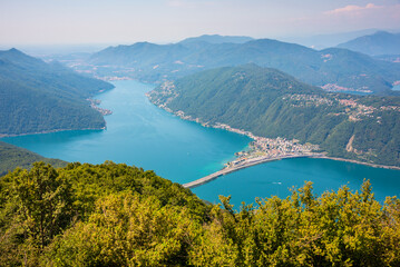 Fototapeta na wymiar Beautiful mountain lake with a bridge in Switzerland