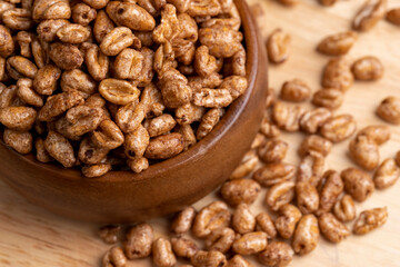 Airy wheat covered with a thin layer of cocoa chocolate