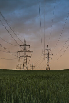 High Voltage Pylons at Sunrise