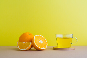 A front view of orange decorated with tea