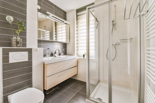 Stylish bathroom interior with furniture