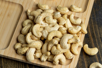 Hard roasted and peeled cashew nuts on the table