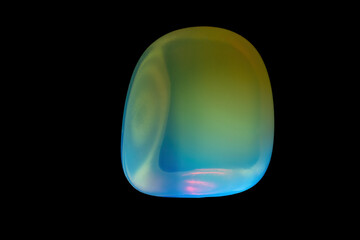 Mineral opal illuminated by light.