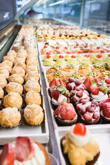 Italian Bakery counter, Window of desserts at a pastry shop. Fresh and tasty products