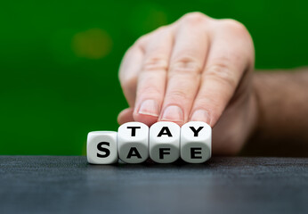 Dice form the expression 'stay safe'.