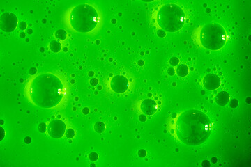 Bubble green background texture. Berry gel to cleanse the skin of the face and body. Spa...