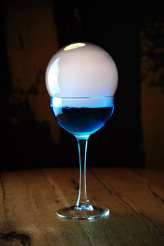 blue cocktail with smoke bubble