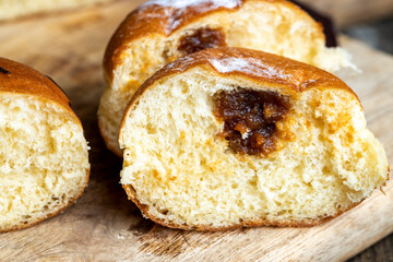 sweet donuts with milk cream filling inside