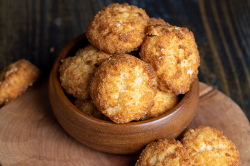 Delicious cookies with coconut on the table