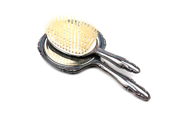 vintage hand brush and hand mirror isolated on white background