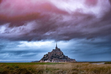 Cloudy sunset over le Mont Saint Michelle in Normandy
