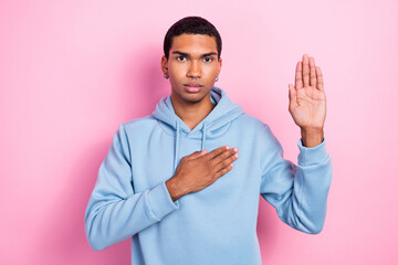 Photo portrait of serious confident face patriot man hold arm chest palm demonstrate promise...