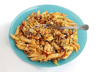 pasta with meat and vegetables as tasty lunch dish close up