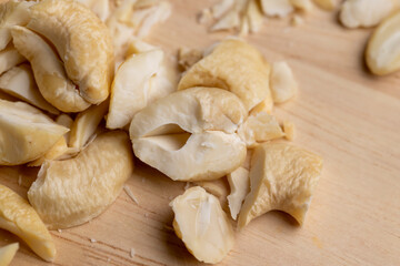 scattered pile of cashew nuts