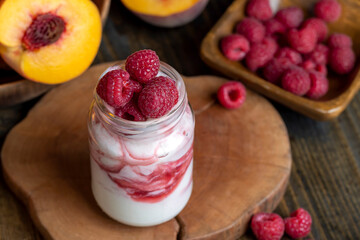 yogurt with fresh berries and raspberry jam