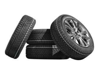 Car tires with a great profile in the car repair shop.  Set of summer or winter tyres in front of white fond. On transparent PNG background.