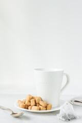 Nigerian Chin chin in a ceramic plate, Fried chin-chin snack in a plate, Nigerian party food and small chops