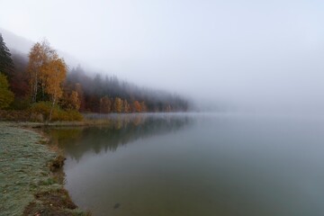 Naklejka na ściany i meble Beautiful misty autumn morning,Saint Ana Lake, Romania