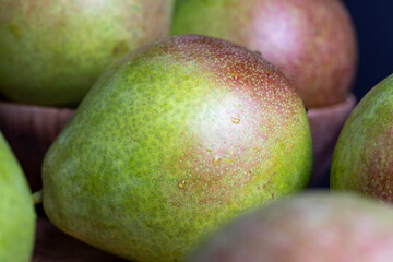 Whole ripe green pears, close up
