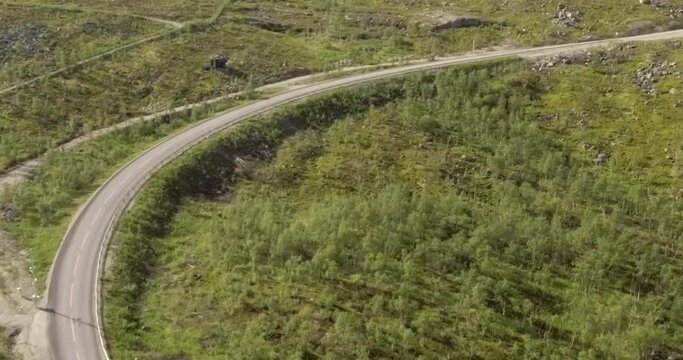 Aerial view of E8 Nordlysveien road near Galggojohka river in summer, Storfjord, Troms og Finnmark, Norway. 