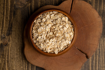 Oat flakes poured on the kitchen table