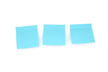 Three blue blank sticky notes on white background. Front view
