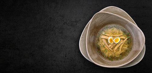 chicken broth with noodles and quail eggs