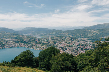 Fototapeta premium Beautiful lake and mountain view from the top of Monte Brè