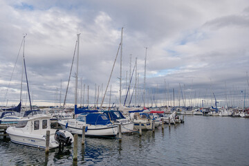 Fototapeta na wymiar Outdoor scenery around Kastrup Havn marina and many boats wharf at the harbour. 
