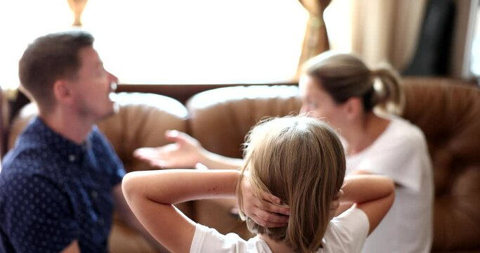 Little girl watching how her parents swearing and covering her ears 4k movie slow motion 